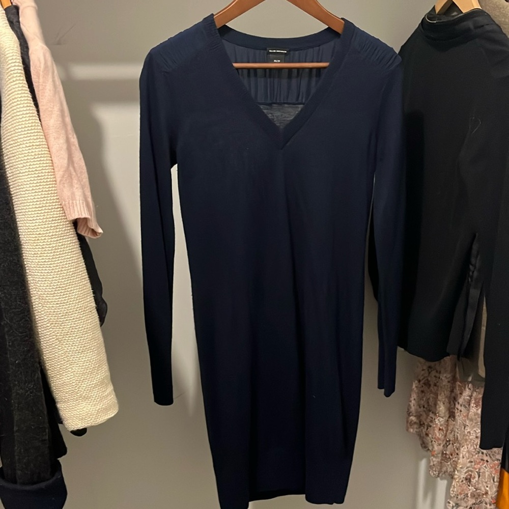 Is a Club Monaco navy blue dress, size XS with a nice detail in the back.